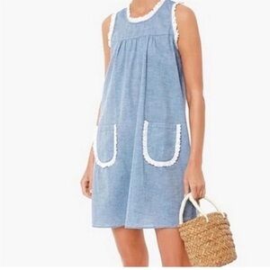 Tuckernuck Chambray dress with white eyelet trim.